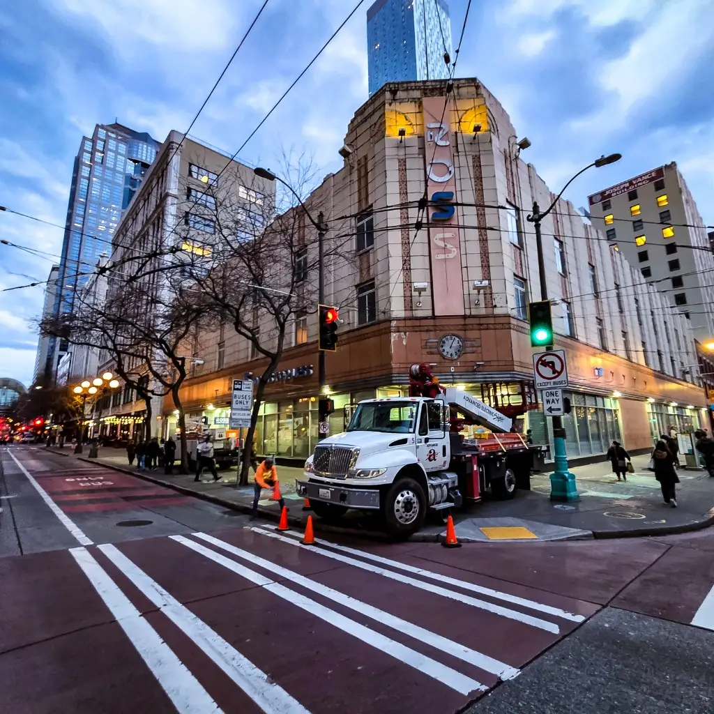 ROSS sign maintenance with boom lift, Seattle
